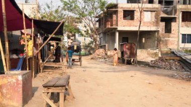 Unidentified people working at a construction site at the Chandrima Housing Society in Dhaka, the capital of Bangladesh, circa March 2020