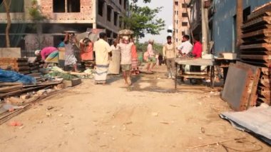Unidentified people working at a construction site at the Chandrima Housing Society in Dhaka, the capital of Bangladesh, circa March 2020
