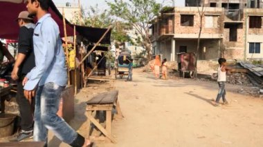 Unidentified people working at a construction site at the Chandrima Housing Society in Dhaka, the capital of Bangladesh, circa March 2020