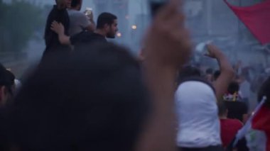 Unidentified people demonstrating against the Iraqi government at the 2019 Iraqi protests, also named Tishreen Revolution or Iraqi Intifada in Baghdad, 2019