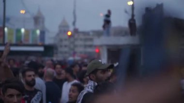 Unidentified people demonstrating against the Iraqi government at the 2019 Iraqi protests, also named Tishreen Revolution or Iraqi Intifada in Baghdad, 2019