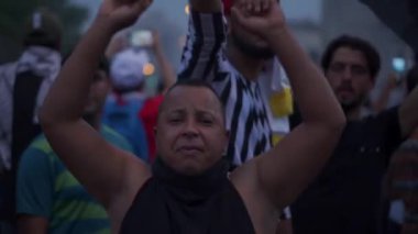 Unidentified people demonstrating against the Iraqi government at the 2019 Iraqi protests, also named Tishreen Revolution or Iraqi Intifada in Baghdad, 2019