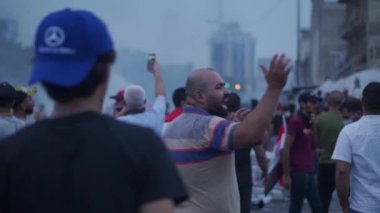 Unidentified people demonstrating against the Iraqi government at the 2019 Iraqi protests, also named Tishreen Revolution or Iraqi Intifada in Baghdad, 2019