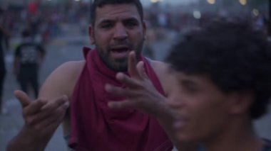 Unidentified people demonstrating against the Iraqi government at the 2019 Iraqi protests, also named Tishreen Revolution or Iraqi Intifada in Baghdad, 2019