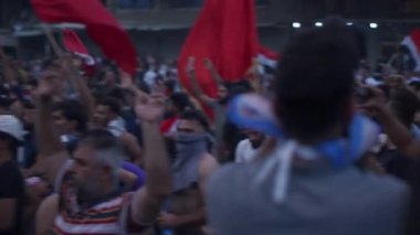 Unidentified people demonstrating against the Iraqi government at the 2019 Iraqi protests, also named Tishreen Revolution or Iraqi Intifada in Baghdad, 2019