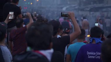 Unidentified people demonstrating against the Iraqi government at the 2019 Iraqi protests, also named Tishreen Revolution or Iraqi Intifada in Baghdad, 2019