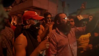 Unidentified people demonstrating against the Iraqi government at the 2019 Iraqi protests, also named Tishreen Revolution or Iraqi Intifada in Baghdad, 2019