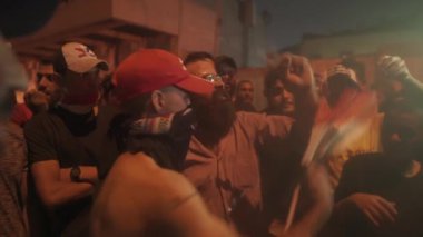 Unidentified people demonstrating against the Iraqi government at the 2019 Iraqi protests, also named Tishreen Revolution or Iraqi Intifada in Baghdad, 2019