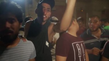 Unidentified people demonstrating against the Iraqi government at the 2019 Iraqi protests, also named Tishreen Revolution or Iraqi Intifada in Baghdad, 2019