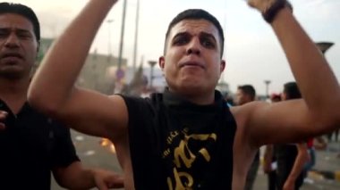 Unidentified people demonstrating against the Iraqi government at the 2019 Iraqi protests, also named Tishreen Revolution or Iraqi Intifada in Baghdad, 2019