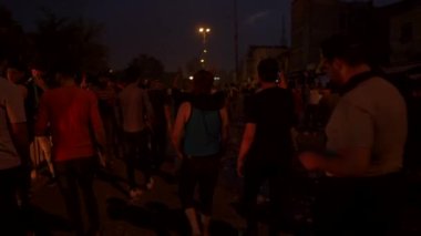 Unidentified people demonstrating against the Iraqi government at the 2019 Iraqi protests, also named Tishreen Revolution or Iraqi Intifada in Baghdad, 2019
