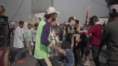 Unidentified people demonstrating against the Iraqi government at the 2019 Iraqi protests, also named Tishreen Revolution or Iraqi Intifada in Baghdad, 2019
