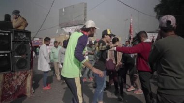 Unidentified people demonstrating against the Iraqi government at the 2019 Iraqi protests, also named Tishreen Revolution or Iraqi Intifada in Baghdad, 2019