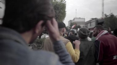 Unidentified people demonstrating against the Iraqi government at the 2019 Iraqi protests, also named Tishreen Revolution or Iraqi Intifada in Baghdad, 2019