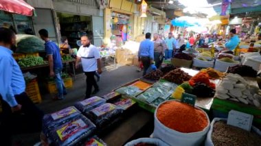 Unidentified people at a market in Gaza City, West Bank, the largest city of the State of Palestine, circa August 2021