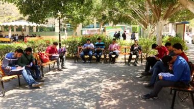 Unidentified people in a park in Gaza City, West Bank, the largest city of the State of Palestine, circa August 2021