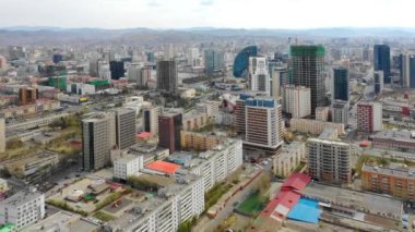 Aerial view of the buildings and streets of Ulaanbaatar, the capital of Mongolia, circa June 2021