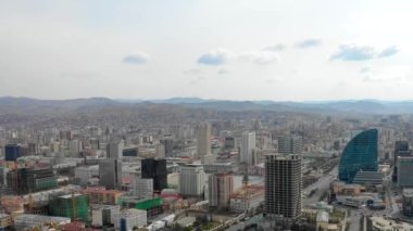 Aerial view of the buildings and streets of Ulaanbaatar, the capital of Mongolia, circa June 2021