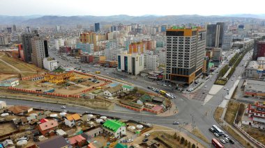 Aerial view of the buildings and streets of Ulaanbaatar, the capital of Mongolia, circa June 2021