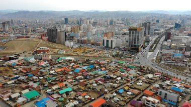 Aerial view of the buildings and streets of Ulaanbaatar, the capital of Mongolia, circa June 2021