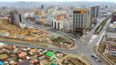 Aerial view of the buildings and streets of Ulaanbaatar, the capital of Mongolia, circa June 2021