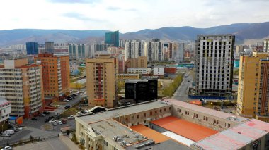 Aerial view of the buildings and streets of Ulaanbaatar, the capital of Mongolia, circa June 2021