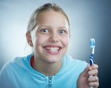 meisje met tandenborstel