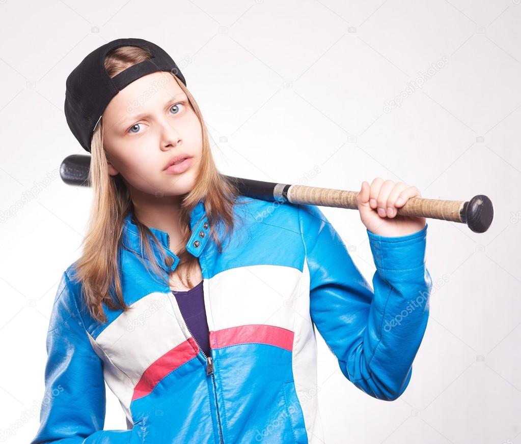 Portrait of a teen girl with bat 
