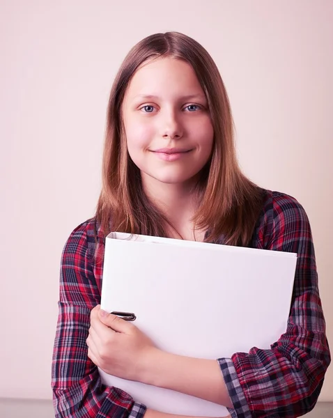 Portrait of a school girl with folder — Stock Photo, Image