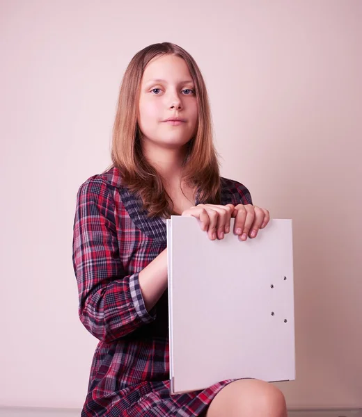 Portrait of a school girl with folder — Stock Photo, Image
