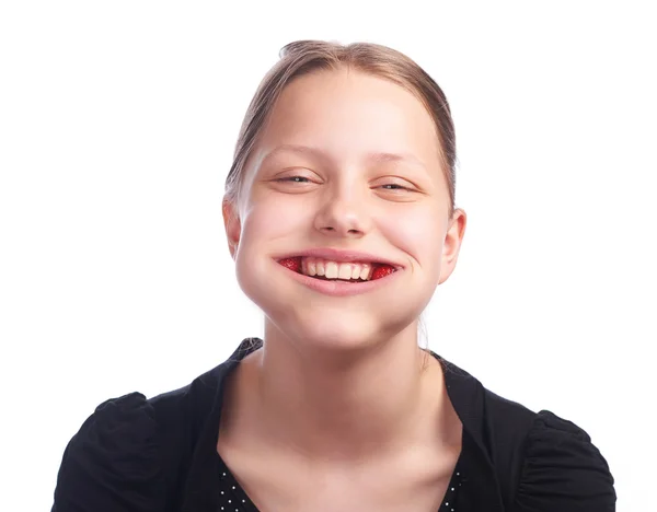 Teen girl eating strawberry — Stock Photo, Image