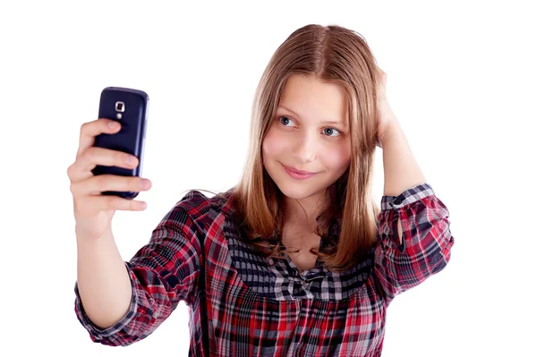 Happy teen girl make pictures of herself — Stock Photo, Image