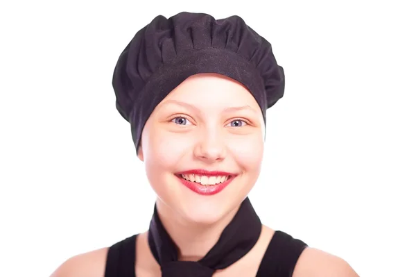 Teen girl dressed in chef hat — Stock Photo, Image