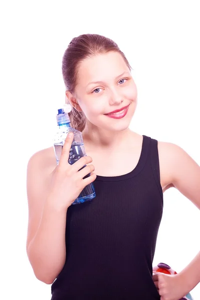 Havlu ve şişe suyu tutan genç kız — Stok fotoğraf