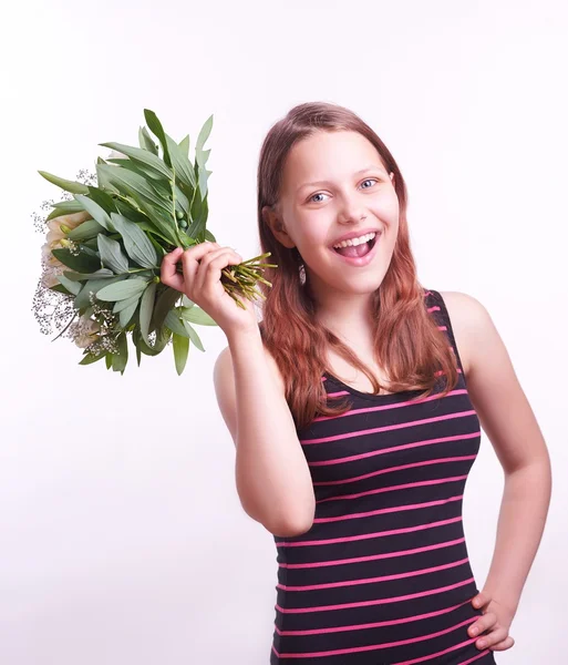 Teen girl with a bouquet of flowers — Stock Photo, Image