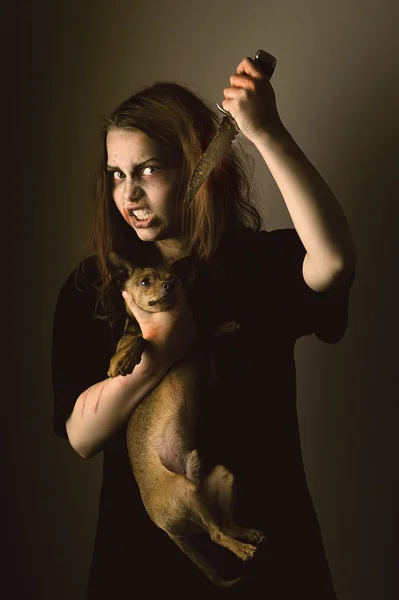 Girl possessed by a demon sacrificed dog — Stock Photo, Image
