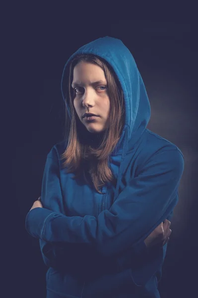 Afraided teen girl in hood — Stock Photo, Image