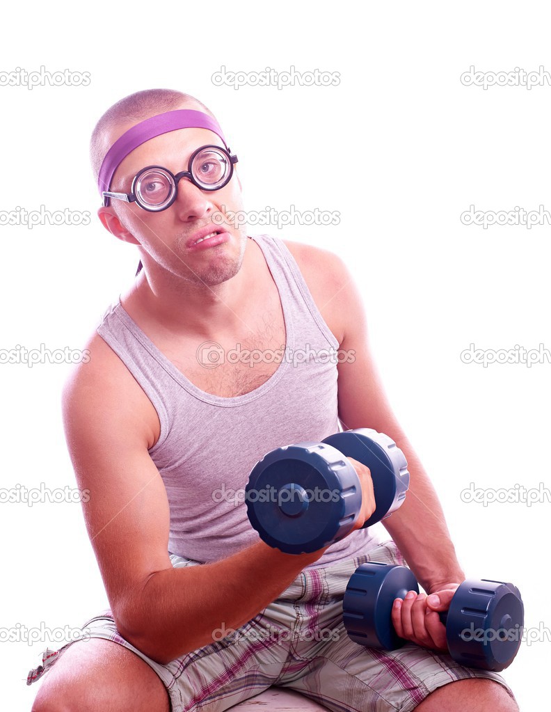 Nerd in glasses with dumbbell trains
