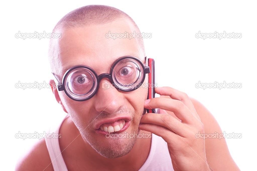 Satisfied nerd in eyeglasses calls by mobile phone