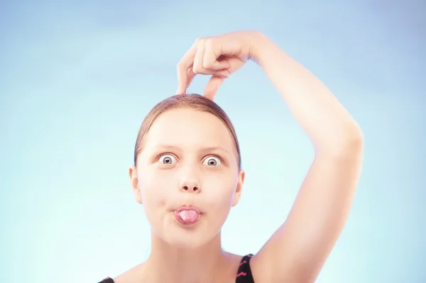 Teen girl grimacing — Stock Photo, Image