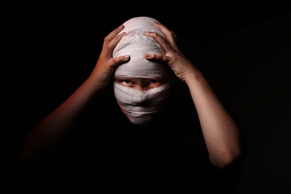 Infected sick girl with a bandage on her head — Stock Photo, Image