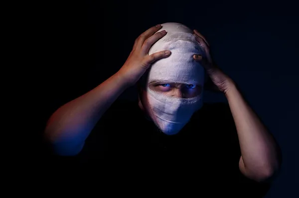 Infected sick girl with a bandage on her head — Stock Photo, Image