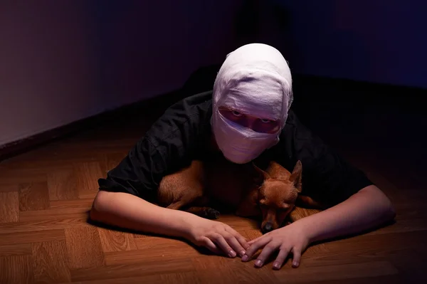 Infected sick girl with a bandage on her head — Stock Photo, Image