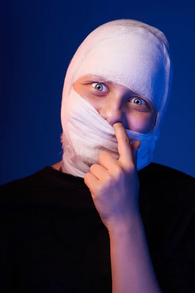 Infected sick girl with a bandage on her head — Stock Photo, Image