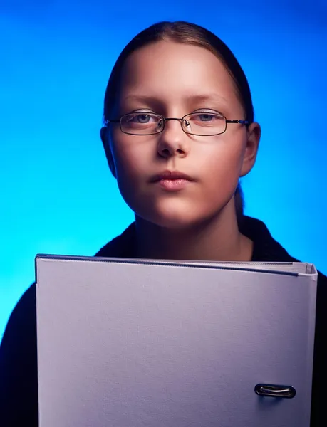 Young businesswoman in glasses holds folder — Stock Photo, Image