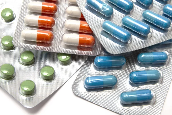 Colorful capsules and pills — Stock Photo, Image