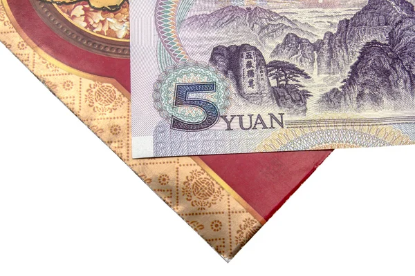 Kinesiska lucky pengar röda kuvert och yuan — Stockfoto