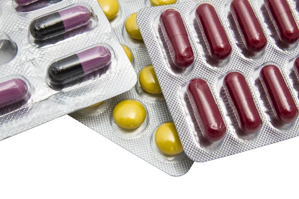 Färgglada kapslar och tabletter — Stockfoto