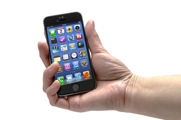 IPhone 5: or i en hand — Stockfoto