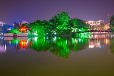 Night shot of Red Bridge in Hoan Kiem Lake, Ha Noi, Vietnam. clipart